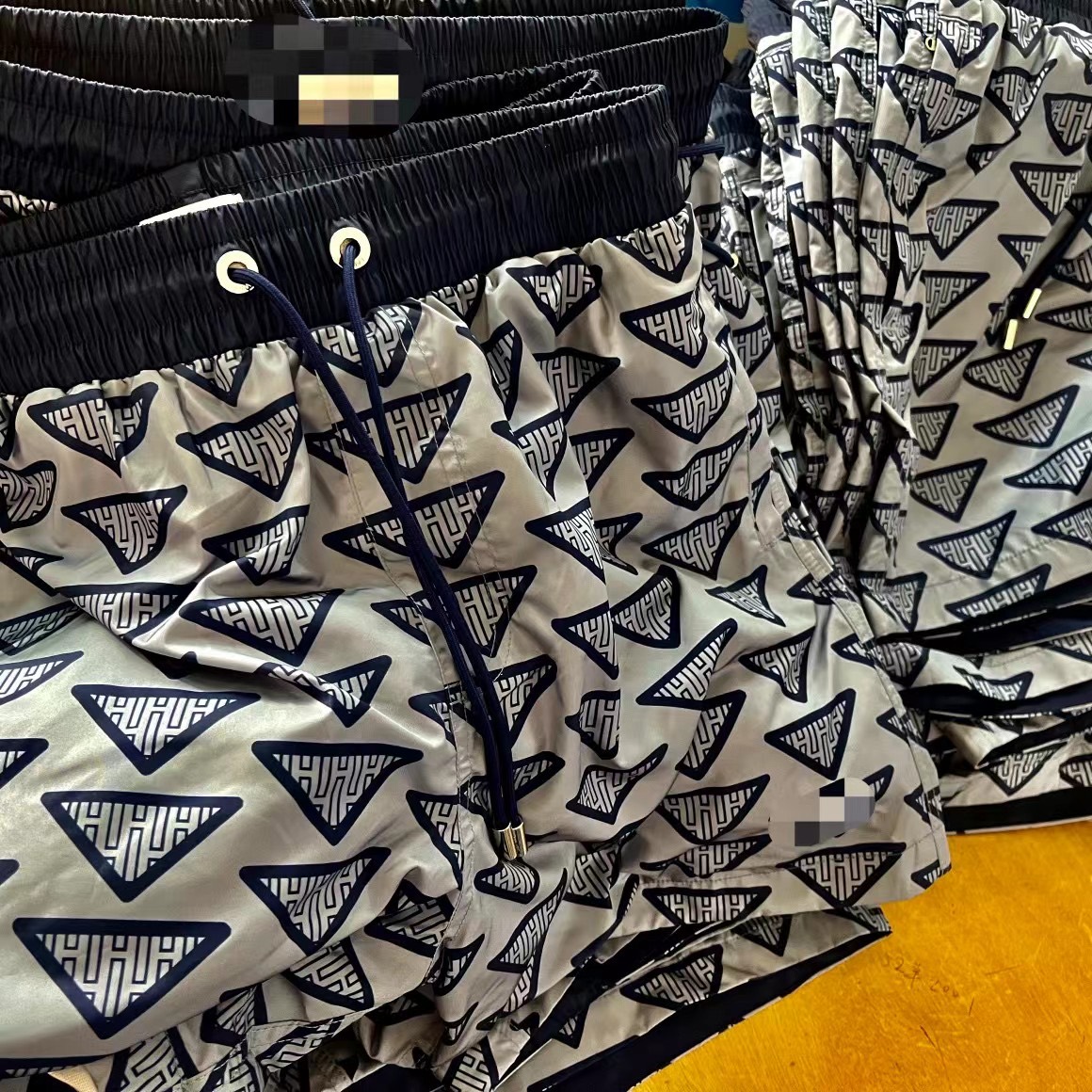 Custom printed board shorts manufactured by Jinfengtu Apparel in Jiangmen China