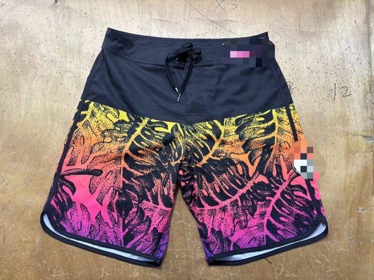 Private-label printed beach shorts made by Jinfengtu Apparel
