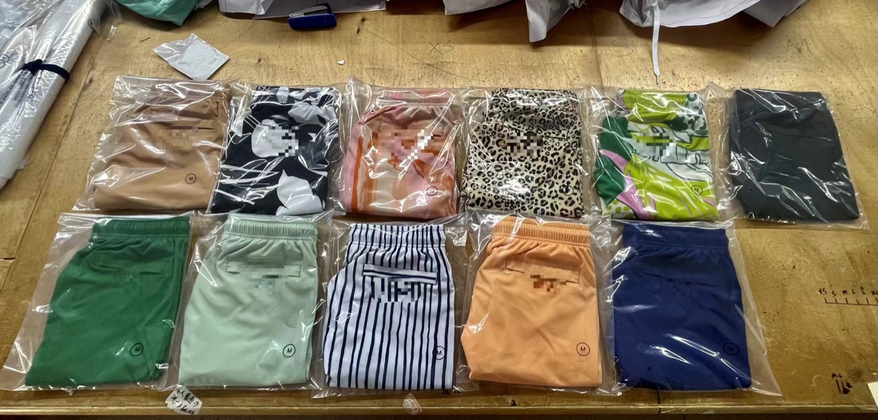 Packaged OEM board shorts produced by Jinfengtu Apparel