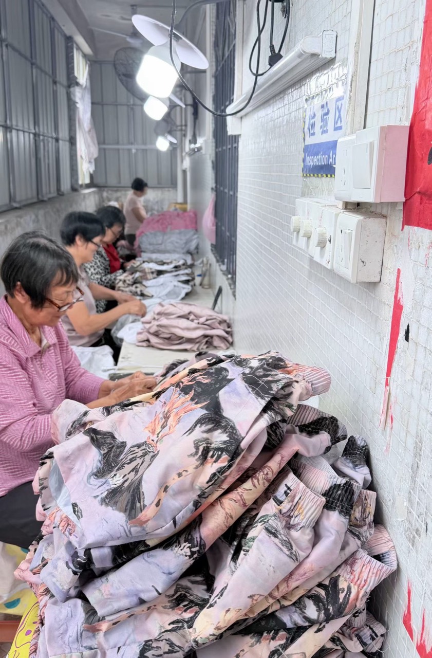 Garment inspection and checking area inside the affiliated Jiangmen production factory