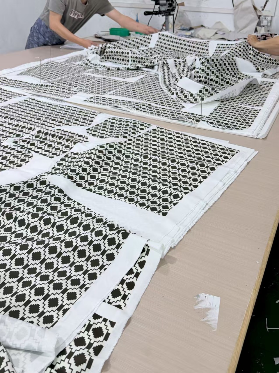 Printed performance fabric prepared for custom board shorts cutting