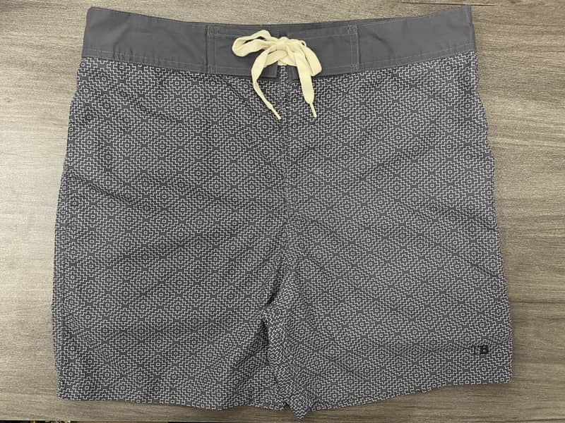 Front view of self-owned charcoal micro-geometric fixed-waist board shorts